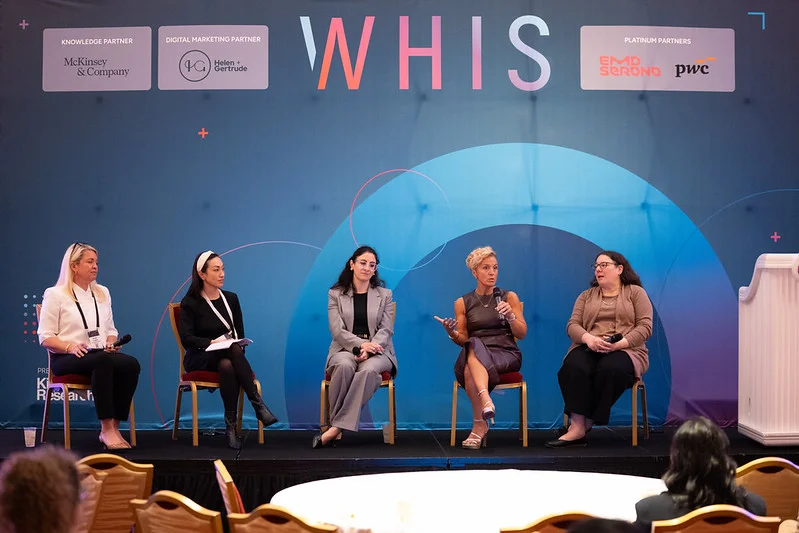 Panel discussion on stage at the Women's Health Innovation Summit (WHIS) 2026